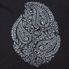 Detail of white embroidered paisley design