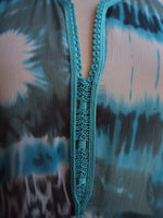 Detail of fabric and hand embroidery 