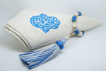 SET OF SIX BLUE & CREAM EMBROIDERED NAPKINS AND BEADED TASSEL RINGS