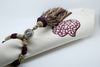 SET OF TEN DARK RED & BEIGE EMBROIDERED NAPKINS AND TASSEL RINGS