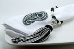 SET OF SIX BLACK & CREAM EMBROIDERED NAPKINS AND TASSEL RINGS