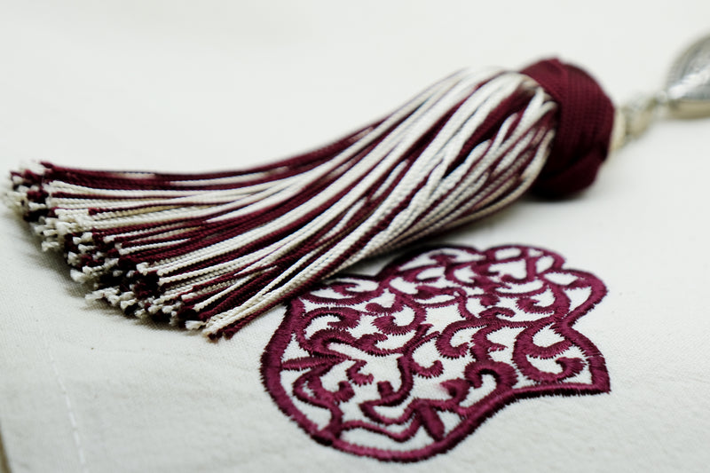 SET OF SIX DARK RED & CREAM EMBROIDERED NAPKINS AND TASSEL RINGS