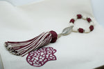 SET OF SIX DARK RED & CREAM EMBROIDERED NAPKINS AND TASSEL RINGS