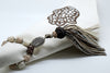 SET OF SIX BROWN & CREAM EMBROIDERED NAPKINS AND TASSEL RINGS & CO-ORDINATING BREAD BAG