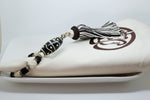 SET OF SIX DARK BROWN & CREAM EMBROIDERED NAPKINS AND BEADED TASSEL RINGS
